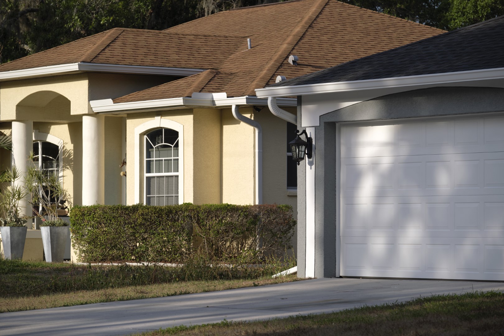wide garage double door and concrete driveway of n 2026 03 16 00 36 14 utc Large Garage Door Opener