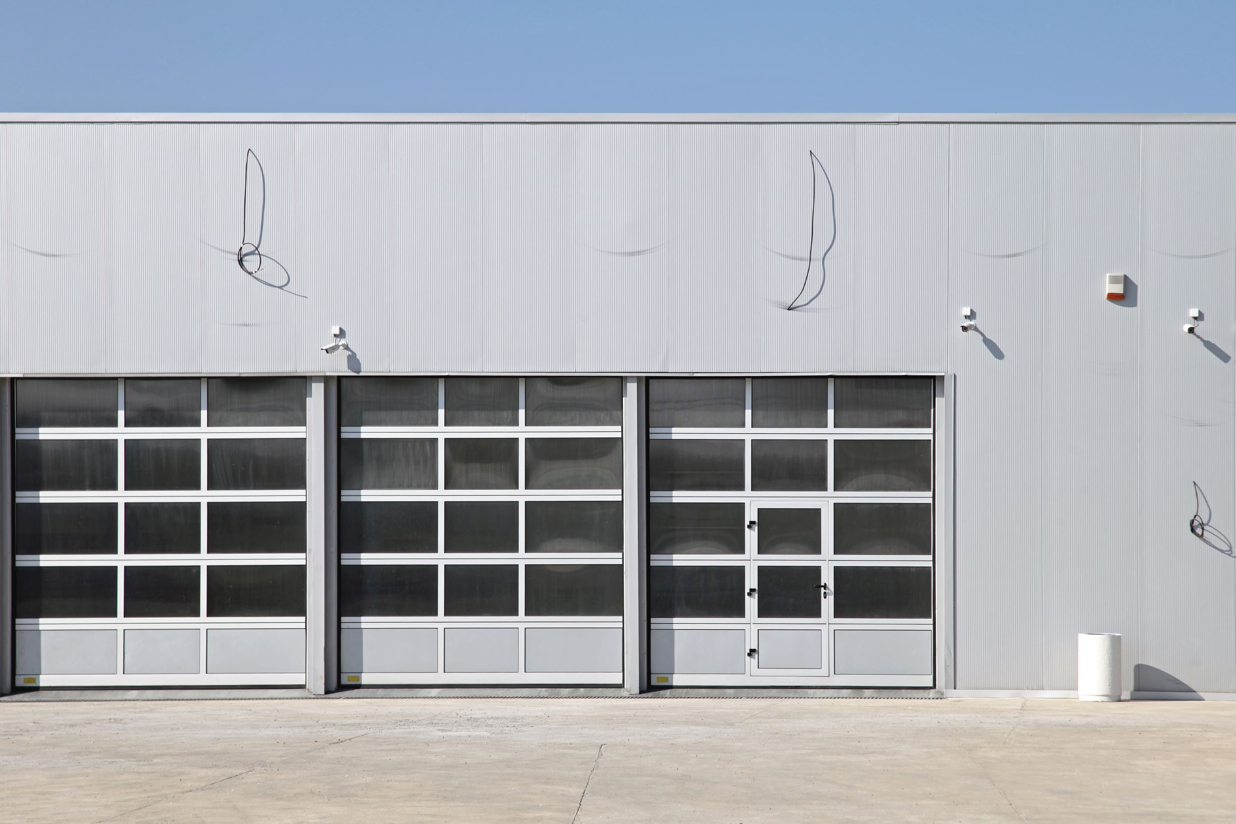 three big doors at new garage service building 2026 03 25 22 49 23 utc1 industrial overhead door service